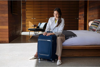 Elevation Plus Carry-On Luggage - Airline Approved Softside Suitcase - 360 Spinner Wheels - Integrated ID Tag - Quick-Access Stash Pocket - Wet Pocket - AirTag™ Holder - Midnight Blue