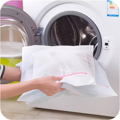 A set of three mesh laundry bags in different sizes, specially designed for washing delicate garments; they also double as travel organizers for clothing. (23.6×19.69in,Large)