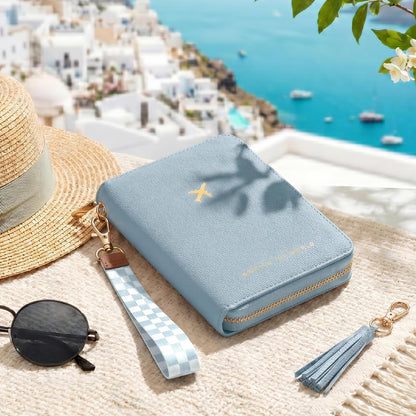 Beautiful Passport Holder And Travel Wallet with Wristlet Strap - All-in-One Organizer for Women with Card Slots and Tassel Keychain - Perfect RFID Blocking Case to Keep Your Documents Safe