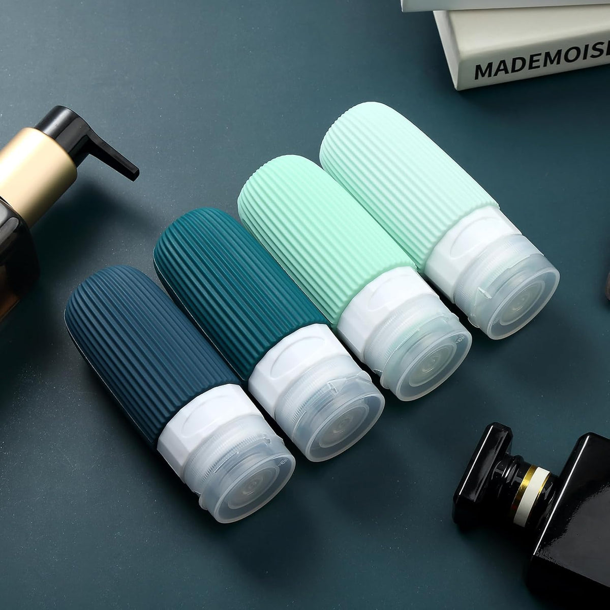 Travel Bottles for Toiletries, Tsa Approved 3oz Portable Travel Bottles, BPA Free Leak Proof Squeezable Silicone Travel Size Containers, Travel Accessories with Clear Toiletry Bag (4 Pack)