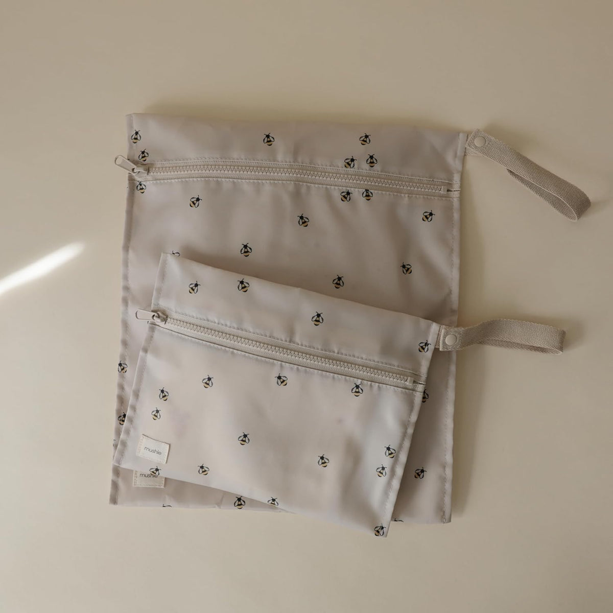 Water Resistant Wet Bags | Large & Small Reusable Storage Bag for Baby Items and Travel | Zippered Pockets with Handle | Machine Washable, Set of 2 (Happy Flowers Check)