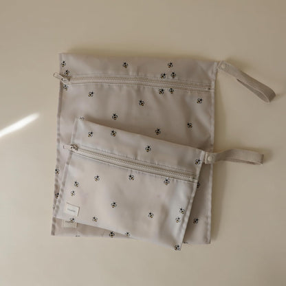 Water Resistant Wet Bags | Large & Small Reusable Storage Bag for Baby Items and Travel | Zippered Pockets with Handle | Machine Washable, Set of 2 (Happy Flowers Check)
