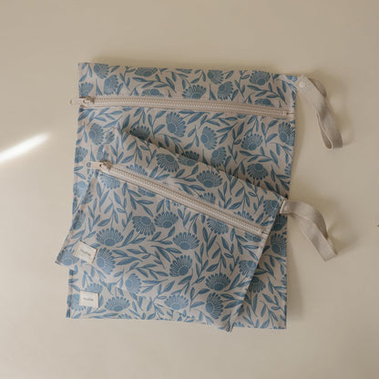 Water Resistant Wet Bags | Large & Small Reusable Storage Bag for Baby Items and Travel | Zippered Pockets with Handle | Machine Washable, Set of 2 (Happy Flowers Check)