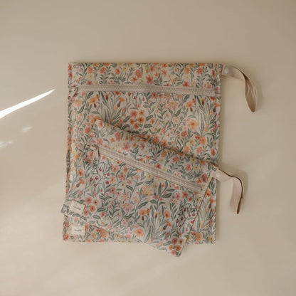 Water Resistant Wet Bags | Large & Small Reusable Storage Bag for Baby Items and Travel | Zippered Pockets with Handle | Machine Washable, Set of 2 (Happy Flowers Check)