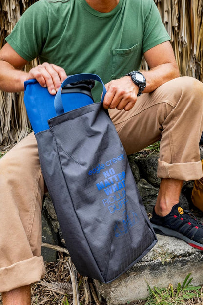 No Matter What Rolling Duffel - Durable Rolling Bag for Travel - Adjustable Shoulder Strap - Heavy Duty Wheels - Lockable Zippers - Multiple Carry Options - 130L - Smoke